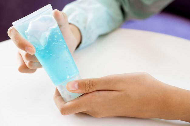 Girl Use Hands Sanitizer Alcohol Gel or Anti-Bacterial Hand Gel to Clean Her Hand and Protect Hands