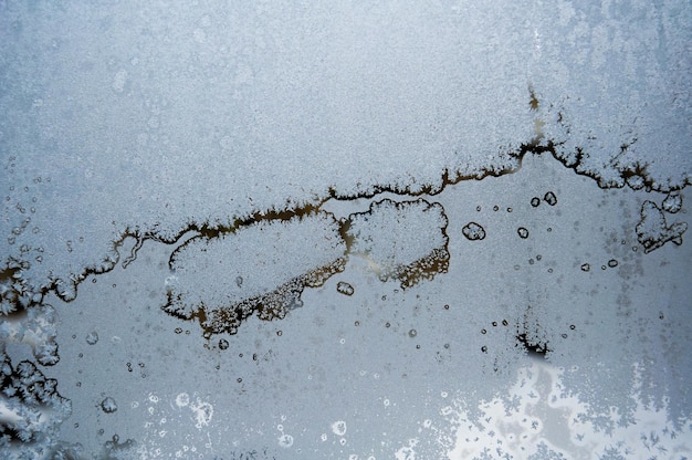 Givre sur le modèle de verre de fenêtre