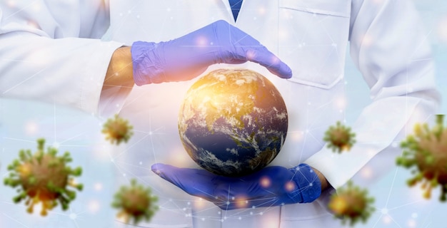 Globe terrestre dans la main du médecin portant un gant pour sauver de la bannière des virus
