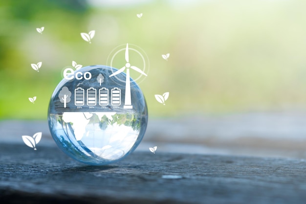 Globe de verre dans une forêt verte avec l'icône environnementale ESG co2 et zéro netTechnologie Environnement Société et gouvernance pour un environnement durable Concept
