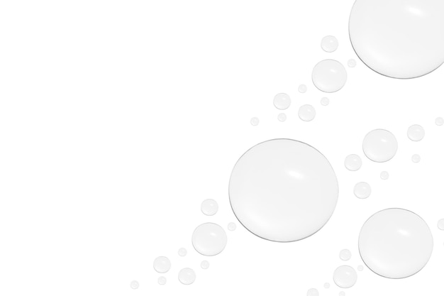 Gouttes de gel transparent ou d'eau de différentes tailles sur fond blanc