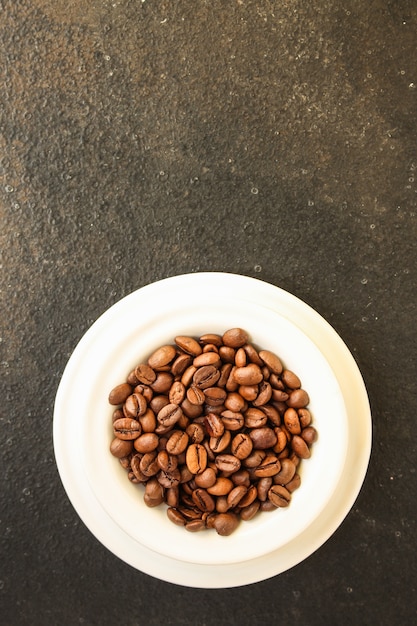 grains de café (bon et mauvais grain) - mélange arabica et robusta (grain de café torréfié).