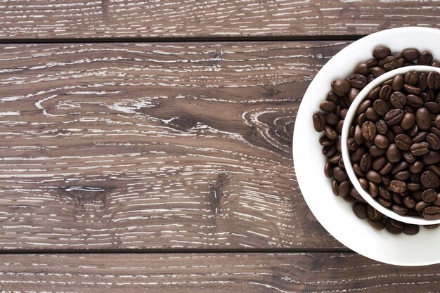 Photo grains de café dans une tasse