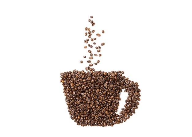 Grains de café disposés en forme de tasse