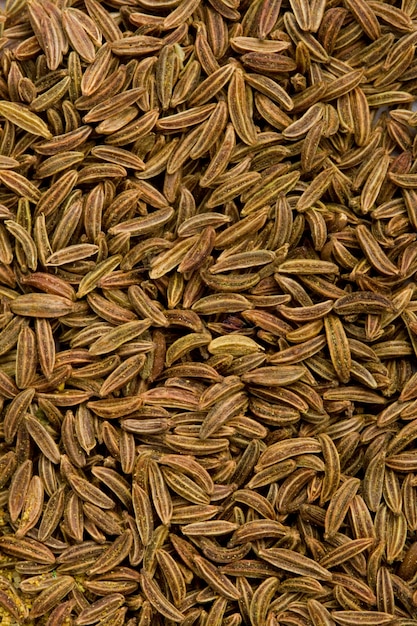 Grains De Cumin Agrandi. Contexte.