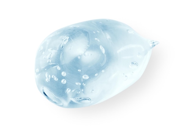 Un grand frottement ou une goutte d'un sérum de gel bleu clair sur un fond transparent vide