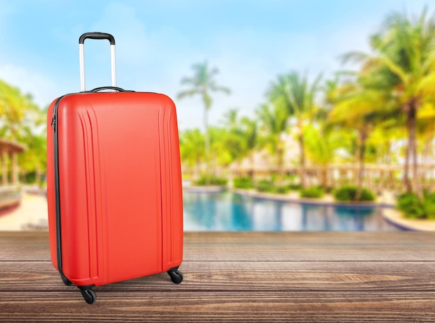 Grande valise de voyage en arrière-plan