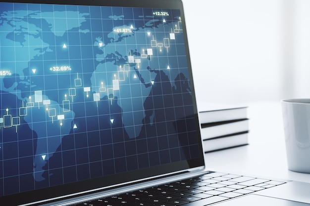 Photo graphique financier créatif abstrait avec carte du monde sur l'écran d'un ordinateur portable moderne concept de forex et d'investissement rendu 3d