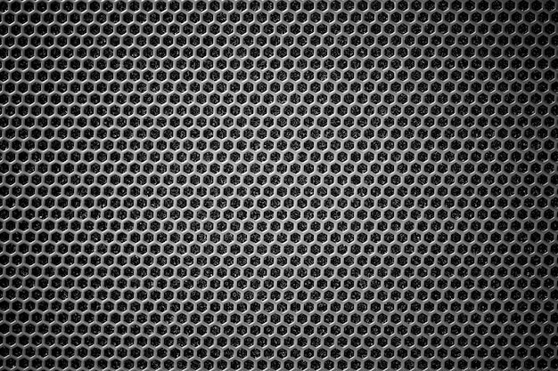 Grille en acier noire avec trous hexagonaux