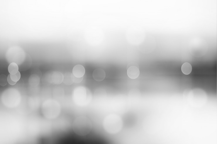 Photo gris flou avec bokeh abstrait