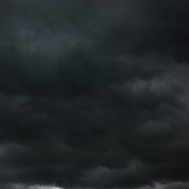 Photo de gros nuages noirs, peuvent être utilisés comme arrière-plan