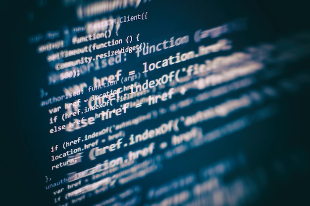 Photo gros plan sur le développement de technologies de programmation et de codage. développeur travaillant sur des codes de sites web au bureau.