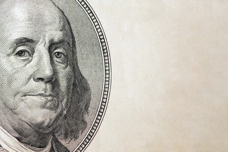Photo gros plan de dollars. portrait de benjamin franklin sur un billet de cent dollars avec espace de copie.