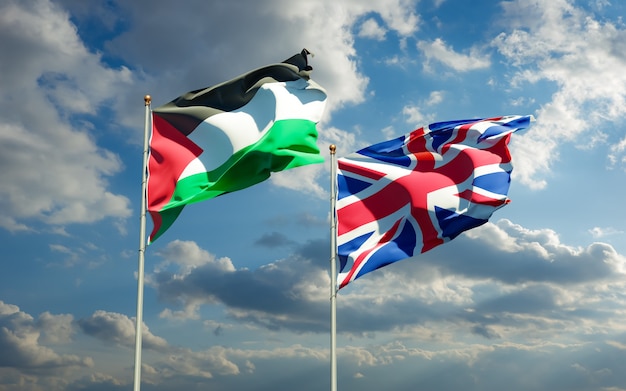 Gros plan sur les drapeaux de la Palestine et britannique britannique