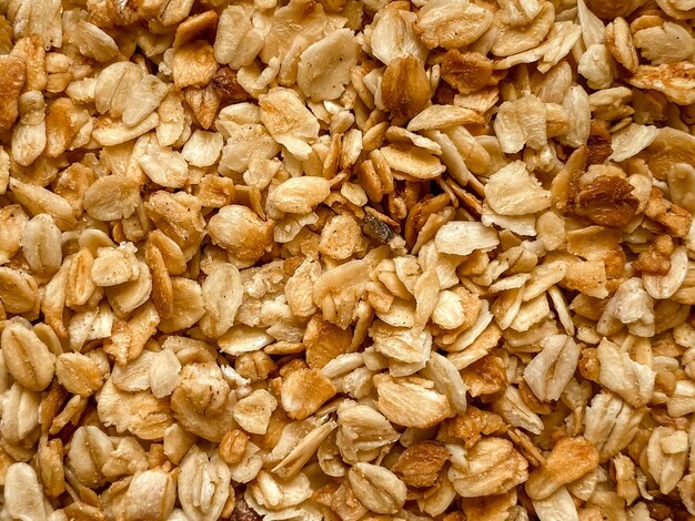 Gros plan du casse-croûte de plat de petit déjeuner de granola de farine d'avoine et de miel