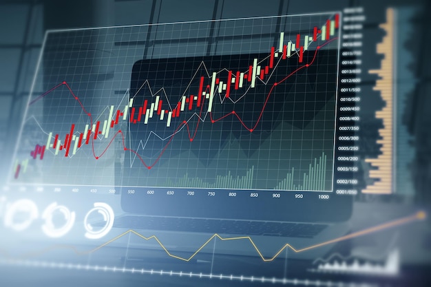 Gros plan de l'espace de travail avec ordinateur portable et graphique forex brillant créatif sur fond flou Finance commerce et concept de tendance Rendu 3D et double exposition