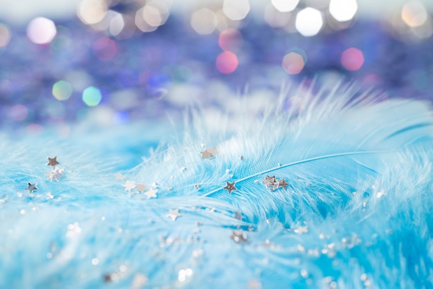 Photo gros plan sur des étincelles bleues et des paillettes