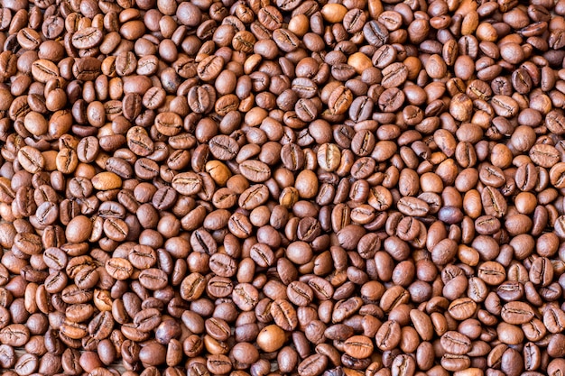 Gros plan sur fond de texture de grains de café