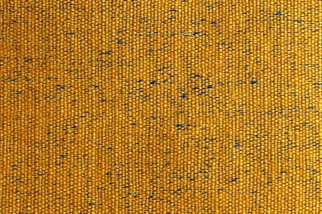 Gros plan sur fond de texture de tissu jaune et bleu