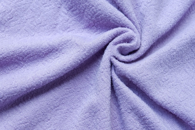 Gros plan sur fond de texture de tissu violet