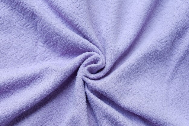 Gros plan sur fond de texture de tissu violet