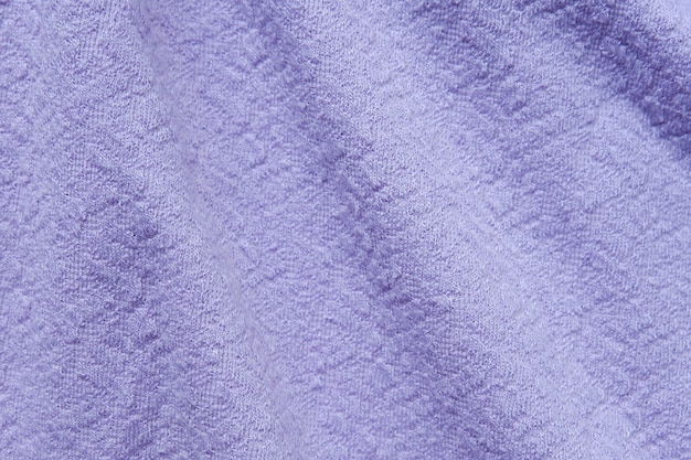 Gros plan sur fond de texture de tissu violet