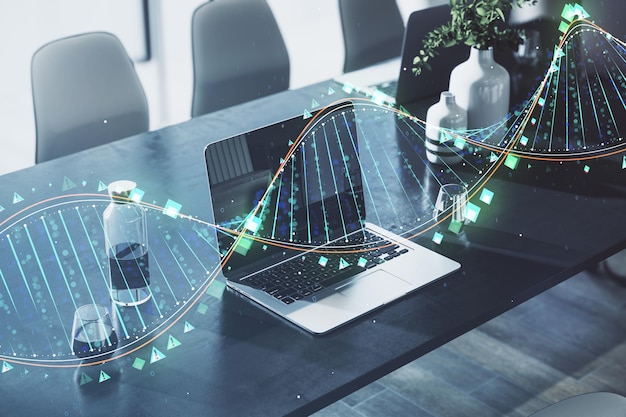 Gros plan sur le lieu de travail avec un ordinateur portable hologramme d'ADN brillant et d'autres éléments sur fond flou Concept de bio-ingénierie et de technologie Rendu 3D