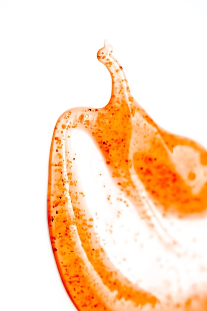 Photo un gros plan d'un liquide orange avec le mot orange dessus