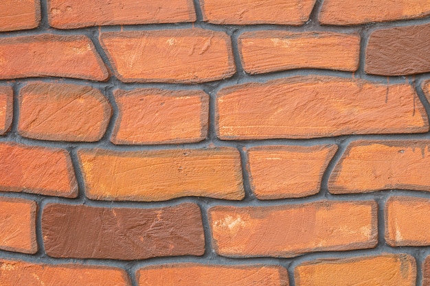 Gros plan motif de briques de surface à fond de mur de briques belle