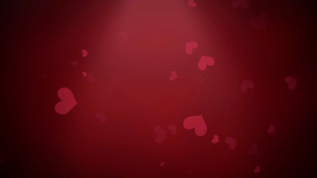Gros plan de petits coeurs rouges romantiques sur fond brillant de Saint Valentin