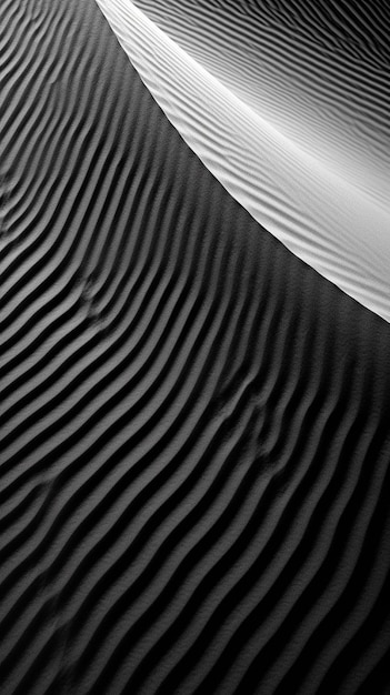 Un gros plan d'une photo en noir et blanc d'une dune de sable générative ai