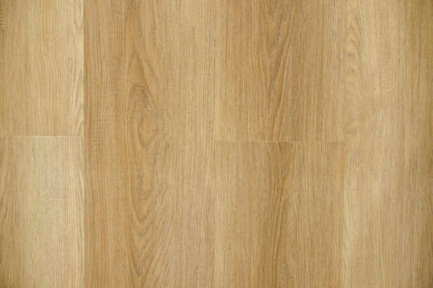 Un gros plan d'un plancher de bois franc avec un fond blanc fond de planche de bois brun clair