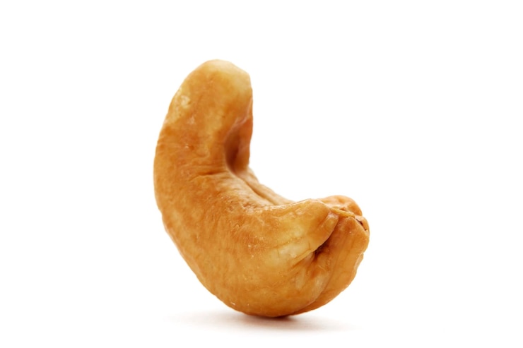 Photo un gros plan de la pomme sur un fond blanc