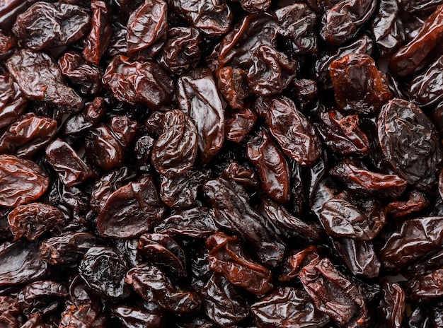 Gros plan des raisins secs, fond de raisins secs. La vue d'en haut