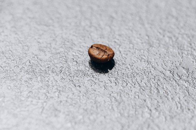 Gros plan rapproché de grains de café torréfiés