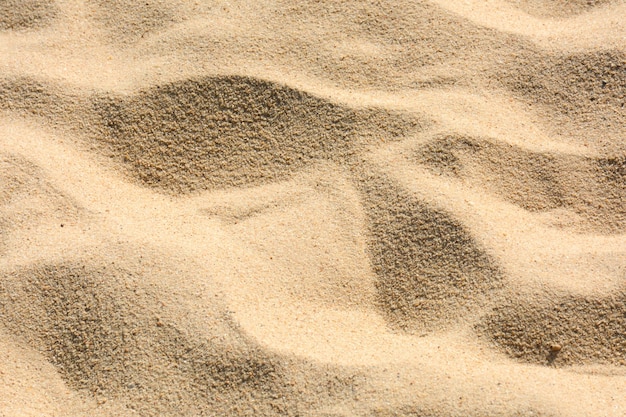 Photo gros plan de sable d'une plage en été