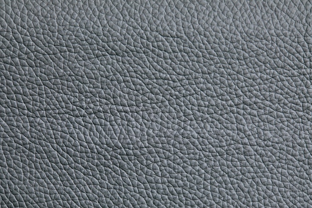 Gros plan de texture de cuir gris foncé utile comme arrière-plan