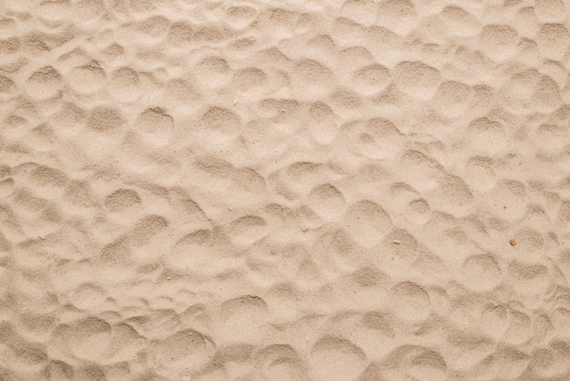 Gros plan de la texture du sable. Fond de sable.