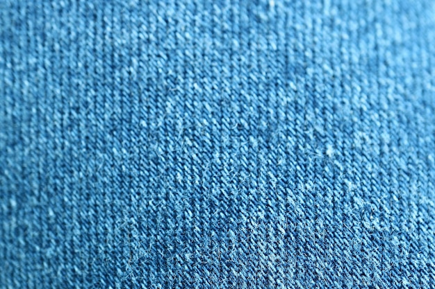 Gros plan de la texture du tissu Blue Jeans avec mise au point sélective