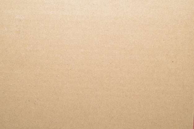 un gros plan d'une texture de fond brun d'une boîte en carton