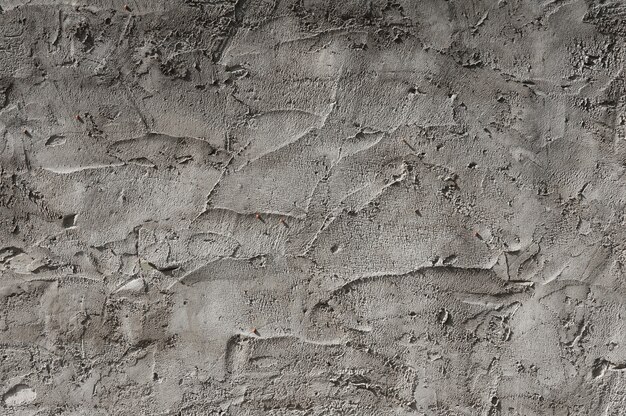 Gros plan, texture, fond de mur gris en béton.