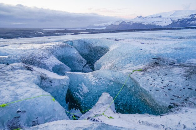 Photo les grottes de glace super bleu islande vatna york péage