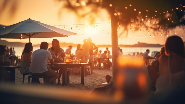 un groupe d'amis dînant et buvant à la plage vacances avec des amis fête amusante temps d'été