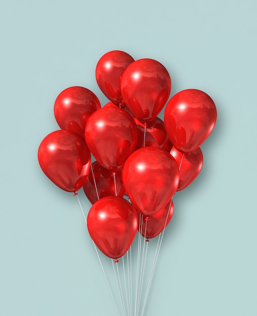 Groupe de ballons à air rouge sur un mur bleu clair. Rendu d'illustration 3D