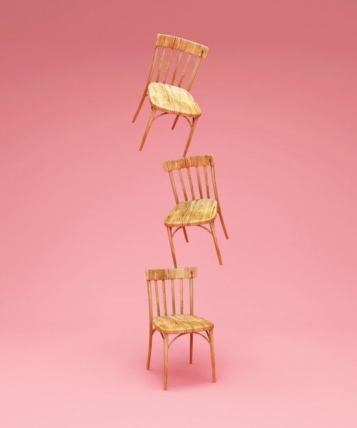 Groupe de chaises en bois sur fond rose studio