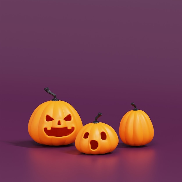 Un groupe de citrouilles d'halloween orange Jack o lantern décor sur violet