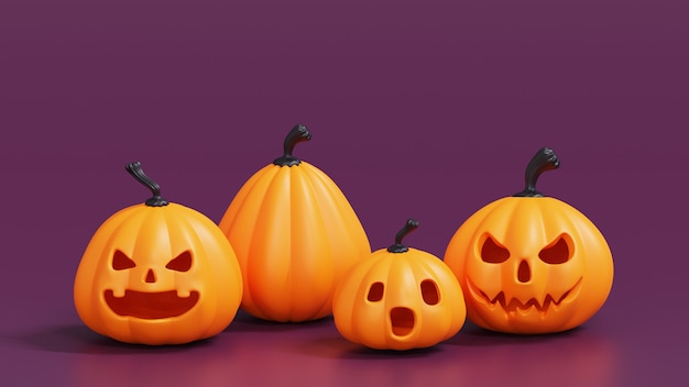 Un groupe de citrouilles d'halloween orange Jack o lantern décor sur violet