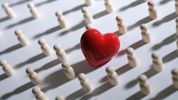 Groupe de figurines en bois avec coeur rouge