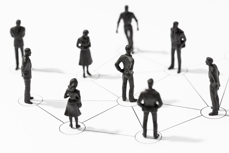 Groupe de figurines de personnes liées Membres connectés les uns aux autres