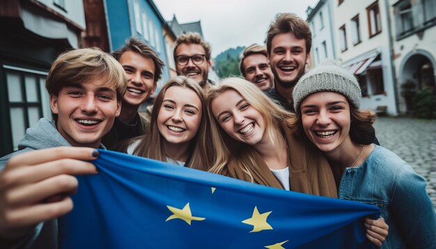 un groupe de jeunes prennent un selfie en arrière-plan, le drapeau de l'union européenne agite